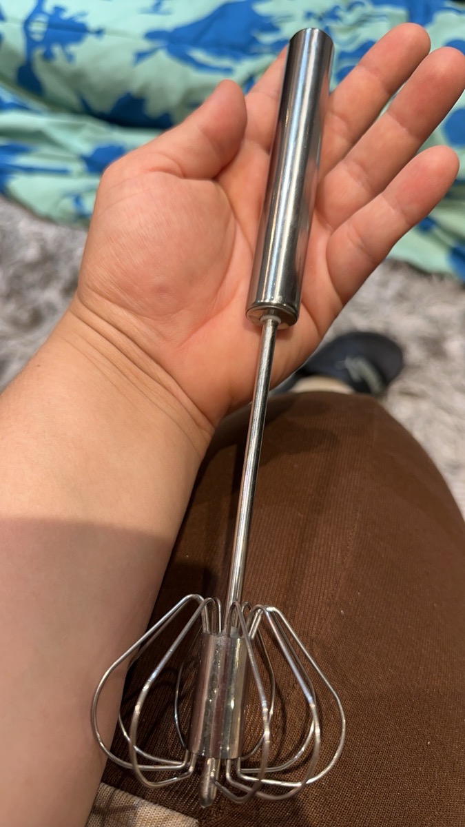 Customer using whisk