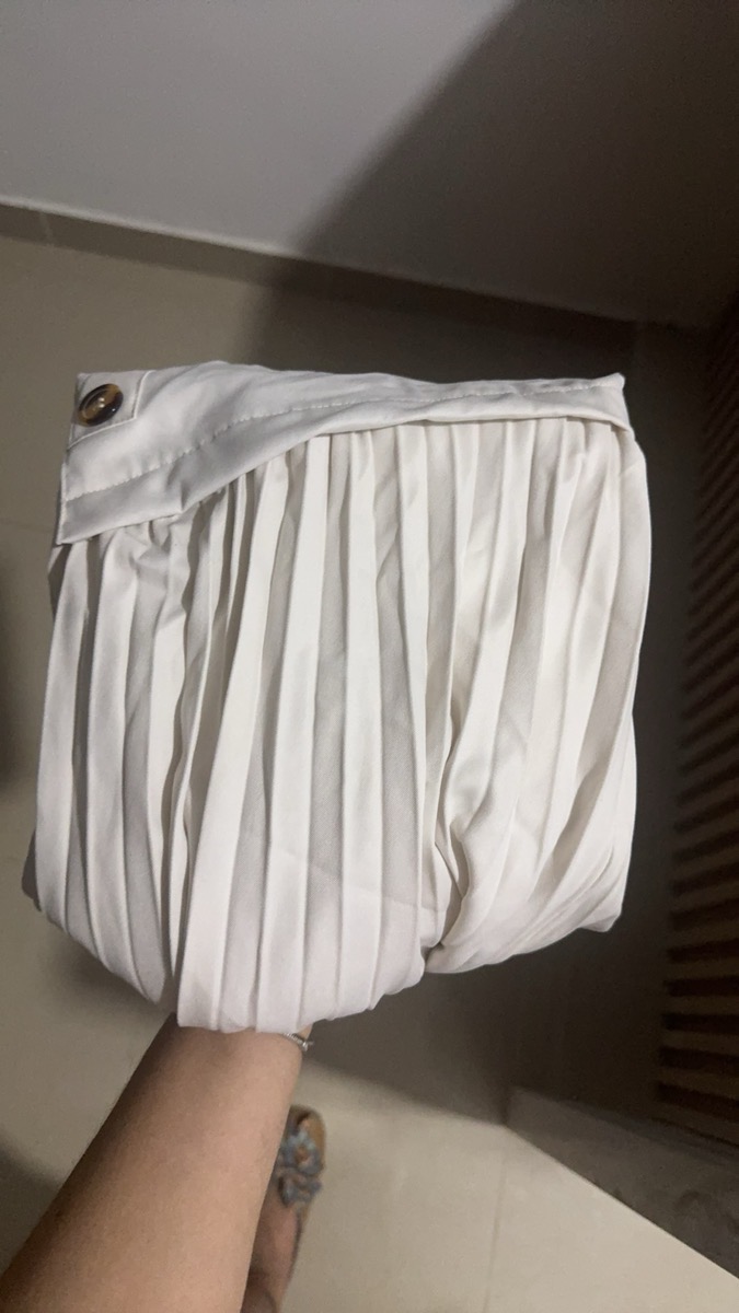 A Spring Season Maxi Skirt Captivating with an Asymmetrical Pleated Hem