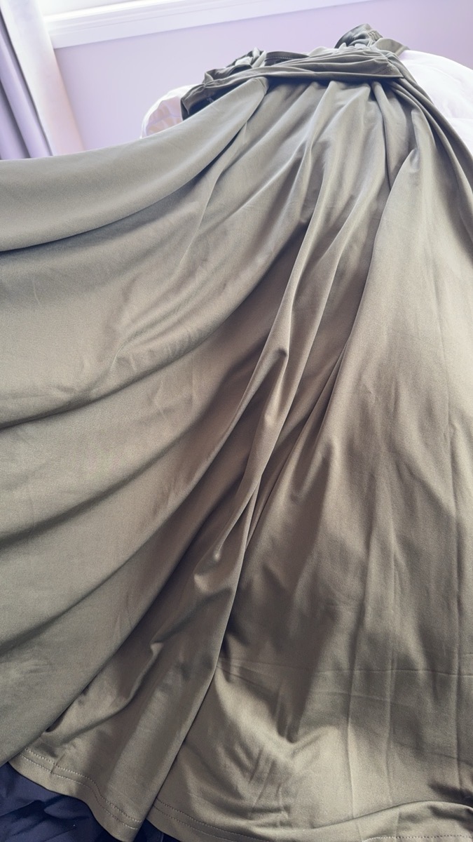 An Elegant Army Green Midi Dress for Plus Sizes, Captivating Featuring a Solid Color